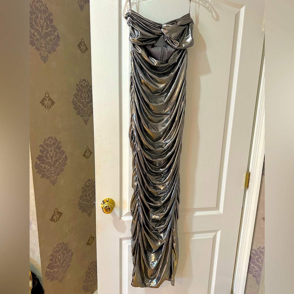 Dress. Can fit a small, medium or large! One size fits all